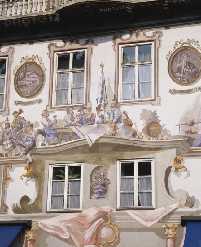 GERMANY, Bavaria, Oberammergau, Close up of Bavarian wall paintings around the windows of a building