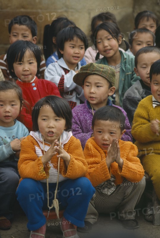 CHINA, Guizhou Province, Zhijin, Crowd of school children.