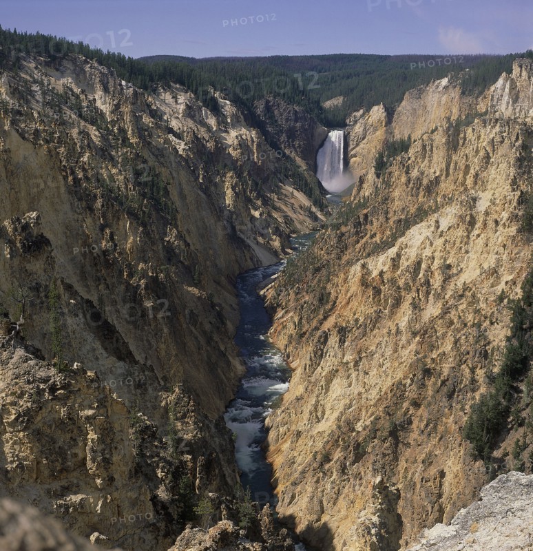 USA, Wyoming, Yellowstone , The Lower Falls waterfall seen from Artists Point as the river below cuts through the landscape