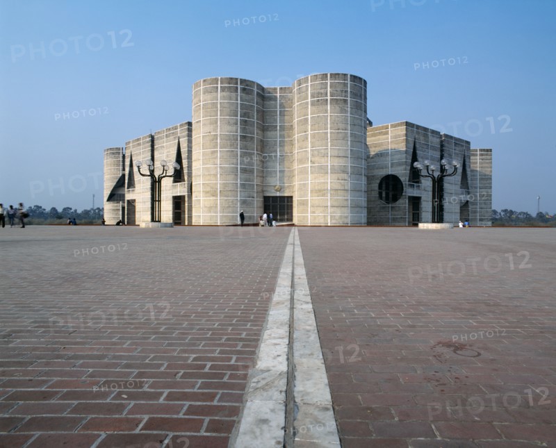 BANGLADESH, Dhaka, Modern stone parliament building with rounded towers.