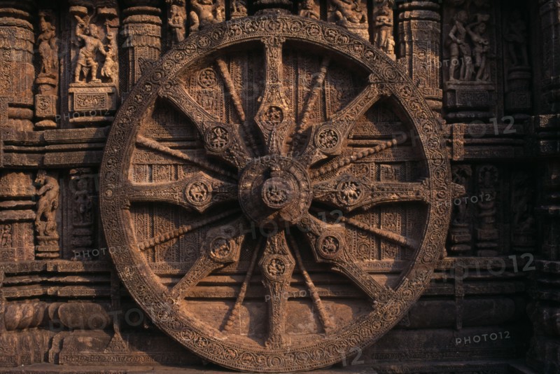 INDIA, Orissa, Konarak, Sun Temple.  Gigantic carved stone wheel.
