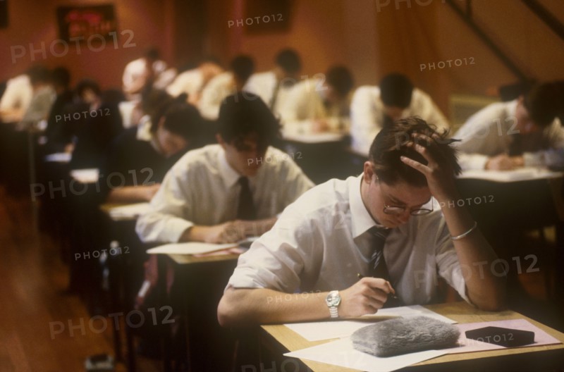 CHILDREN, Education, Examinations, Male teen students taking Advanced level exams