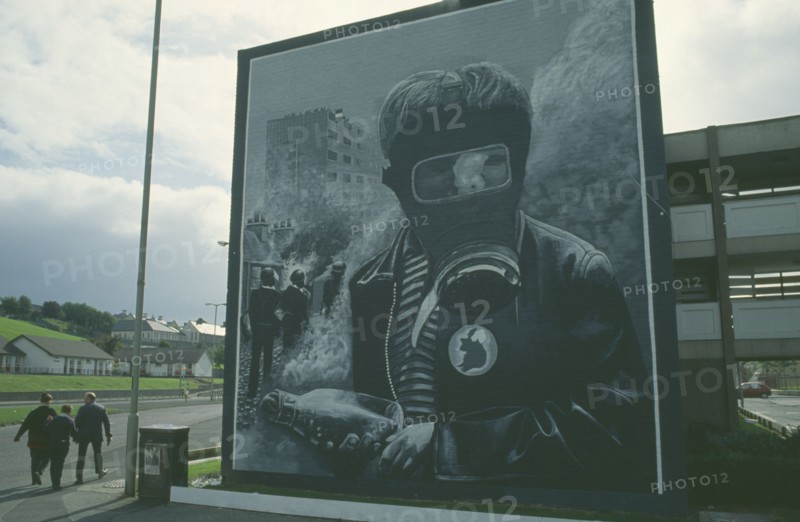 IRELAND,  North  , Derry, Nationalist mural depicting a boy wearing a Gas Mask on the Bogside.