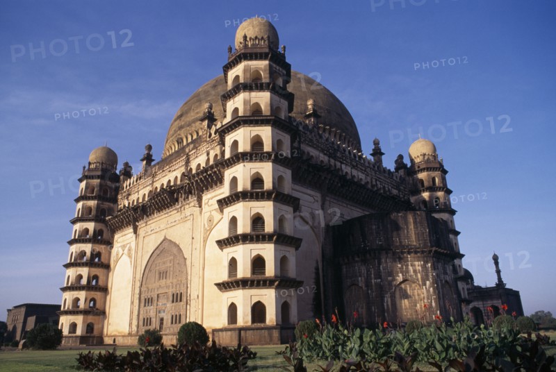 INDIA, Karnataka  , Bijapur, "The Golgumbaz, mausoleum of Mohammed Adil Shah built in 1659.  Exterior view with corner towers and domed roof."