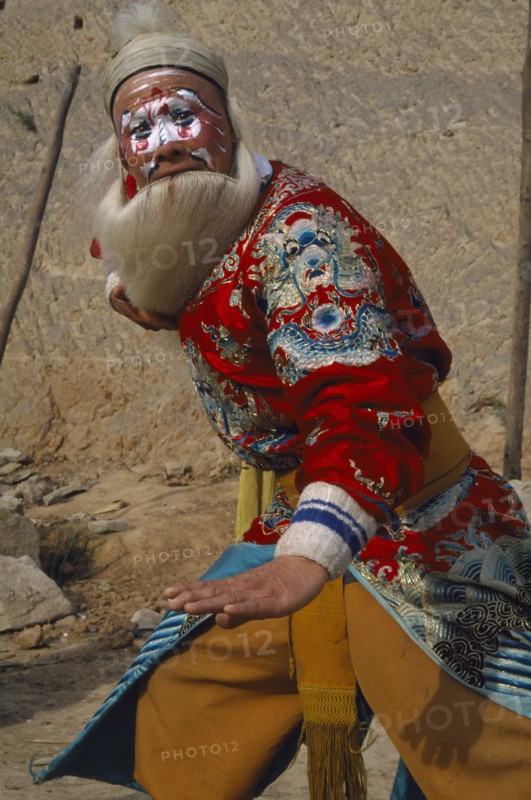 CHINA, Shaanxi , Yan’an, Opera Character in full makeup and costume.