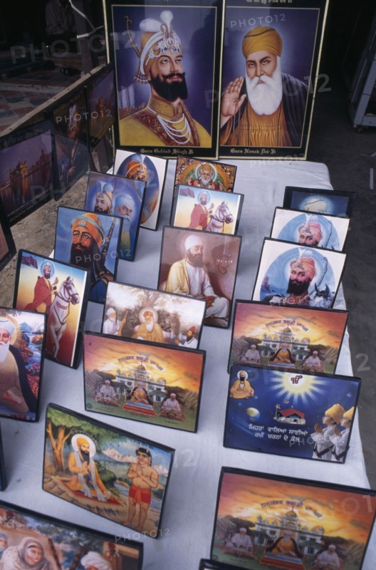 INDIA, Punjab, Amritsar, Souvenir pictures of Sikh gurus for sale.