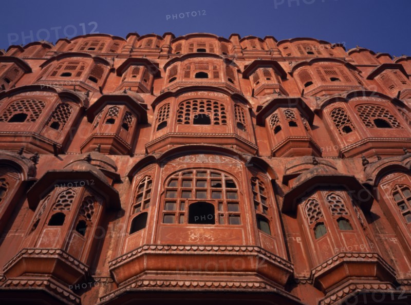INDIA, Rajasthan  , Jaipur, Palace of the Winds or Hawa Mahal. View Looking up at facade