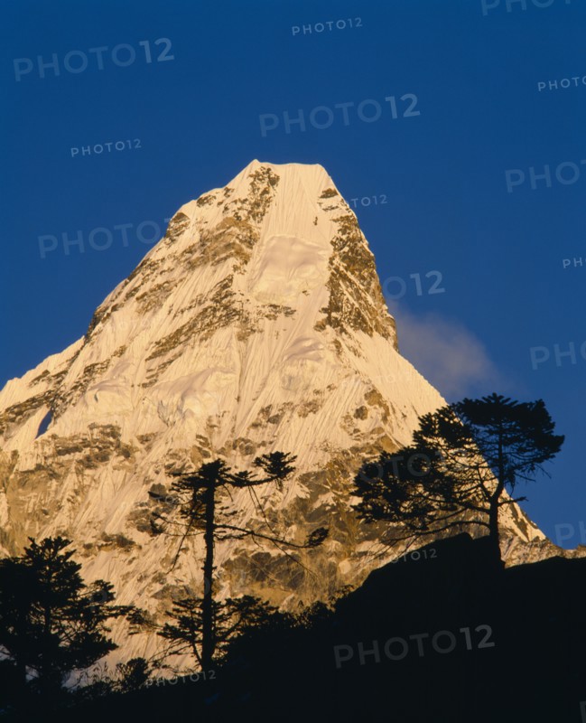 NEPAL, Sagarmatha National Park, Ama Dablam, Himalayan mountain peak in the Khumba Valley at dusk.