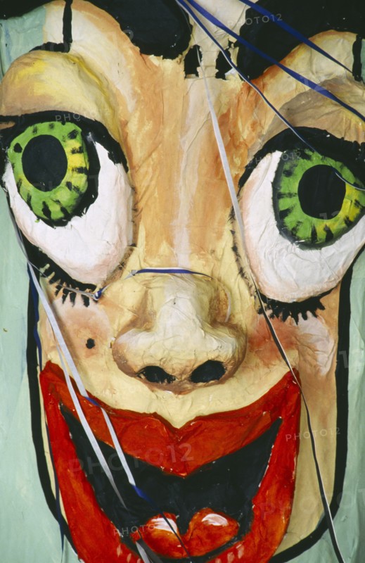 CUBA, Matanzas Province, Varadero, Detail of laughing papier mache mask for the annual carnival