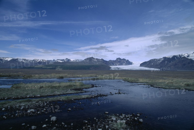 ICELAND,  , Vatnajokull Glacier, Landscape with edge of glacier in distance.