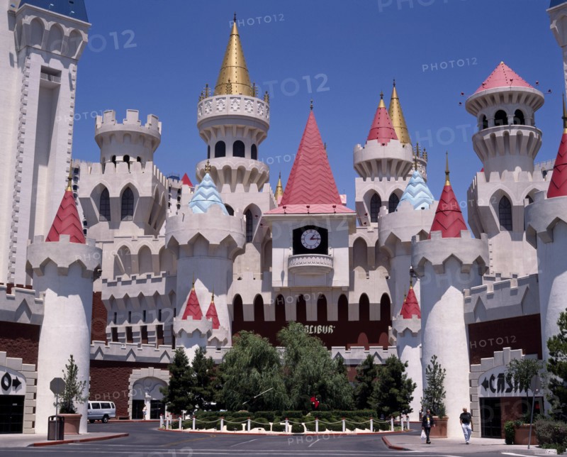 USA, Nevada, Las Vegas, Excalibur Hotel and Casino. Chateau facade of hotel entrance with pink and gold turrets.