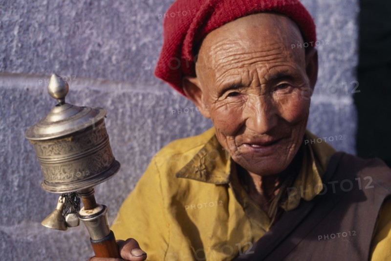 TIBET, Lhasa, Pilgrim at Jokhang temple