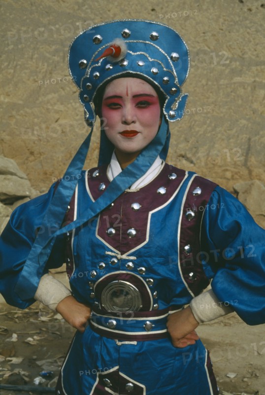 CHINA, Shaanxi, Yan’an, Opera Character in full dress and makeup
