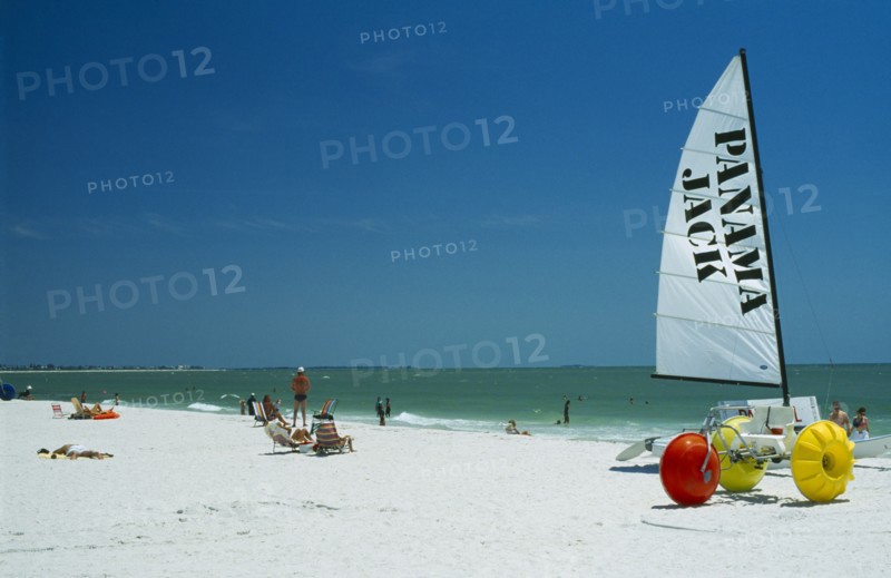 USA, Florida, St.Petersburg, Hobbie cats and pedalos on beach.