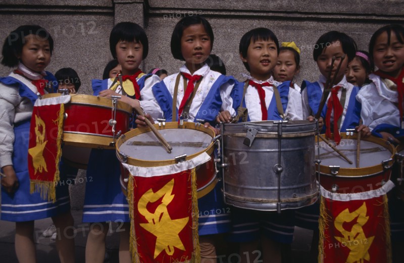 CHINA, Xining, Girls playing drums in school band