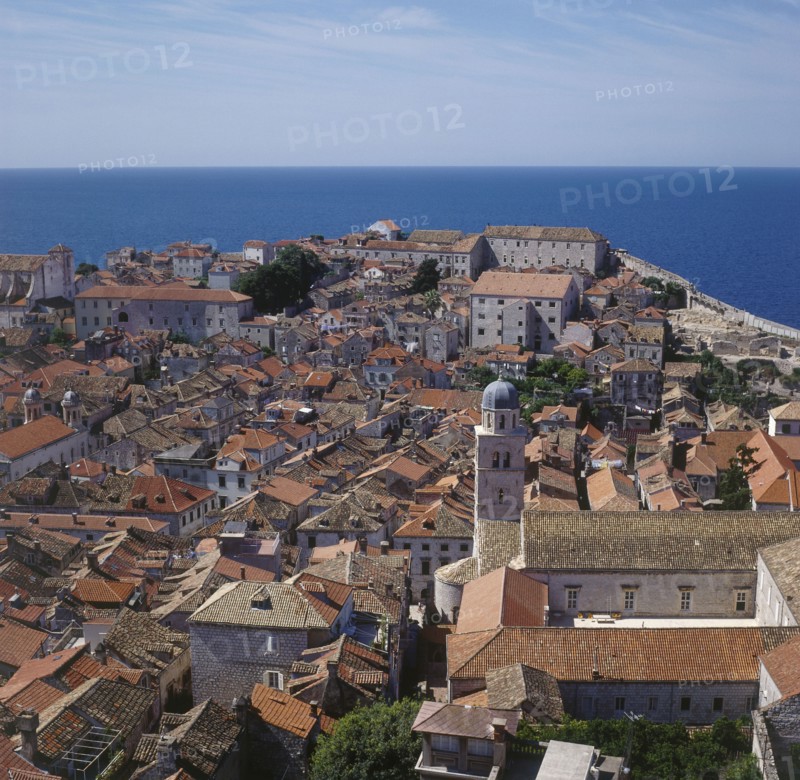 CROATIA, Dubrovnik, View over rooftops towards sea.