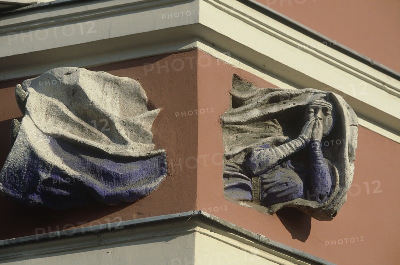 HUNGARY, Budapest, Building detail showing a flying nun passing through the corner of a building