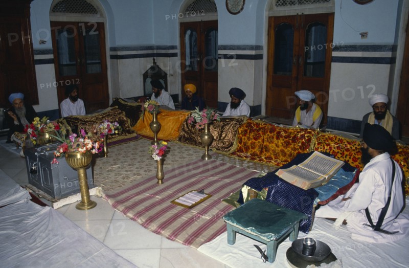 INDIA, Patna, Continuous reading of Guru Granth Sahib Sikh holy book.