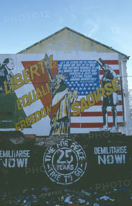 IRELAND, North, Belfast, Saoirse Mural on gable wall in Falls Road next to Dunville Park.