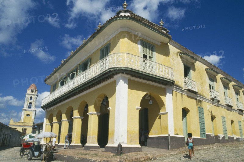 CUBA, Sancti Spiritus, Trinidad, Yellow and white painted Museo Romantico in the Palacio Brunet at one corner of Marti Square