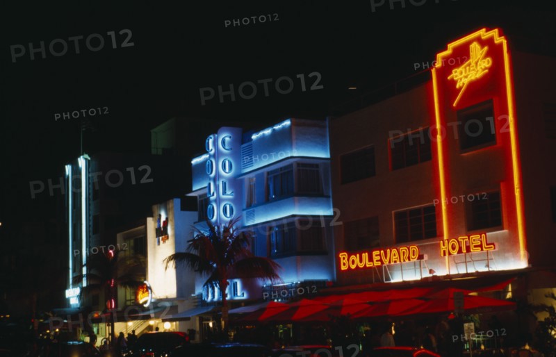 USA, Florida, Miami Beach,  Ocean Drive Art Deco hotels illuminated at night