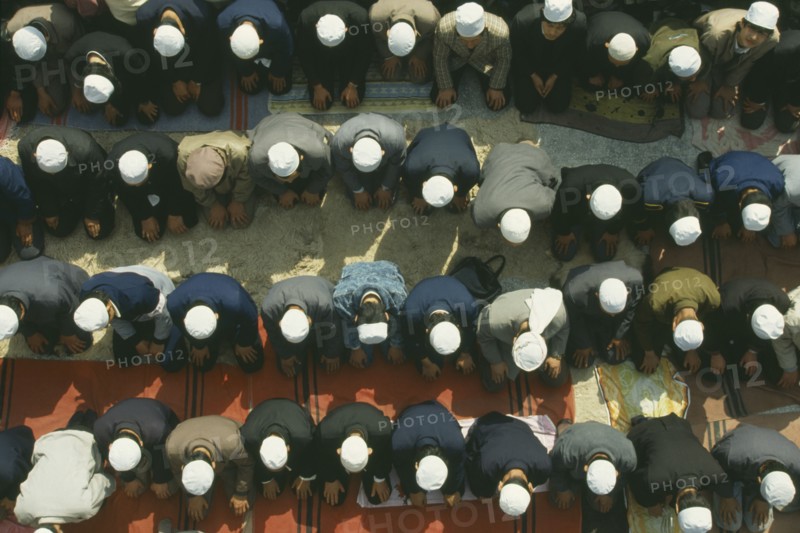 CHINA, Gansu Province, Lanzhou, Looking down on Muslims at prayer.