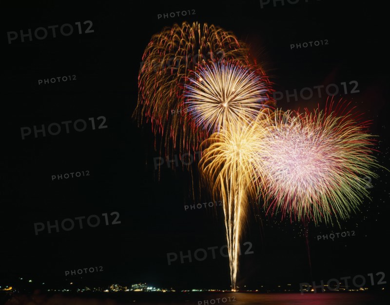 JAPAN, Fireworks, Hanabi Flowers of Fire Fireworks display illuminating the night sky.