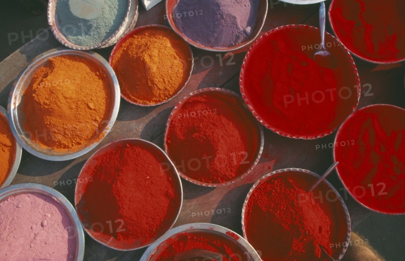 INDIA, Orissa, Puri, Dishes of colourful tika paint powder.