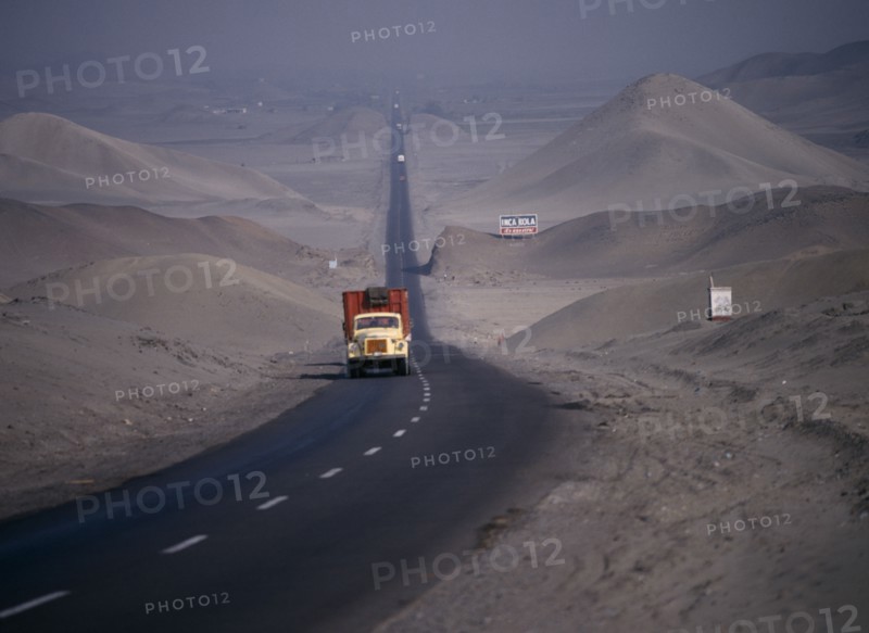Traffic on Pan-American highway through coastal desert, Peru