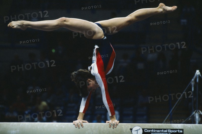 10016400 SPORT Gymnastics Beam Female gymnast on the beam exercise during the World Student Games in Sheffield England