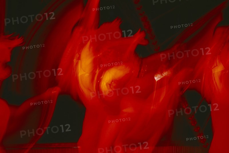 CUBA, Havana Province, Havana, Tropicana Club dancers in blurred movement with long exposure