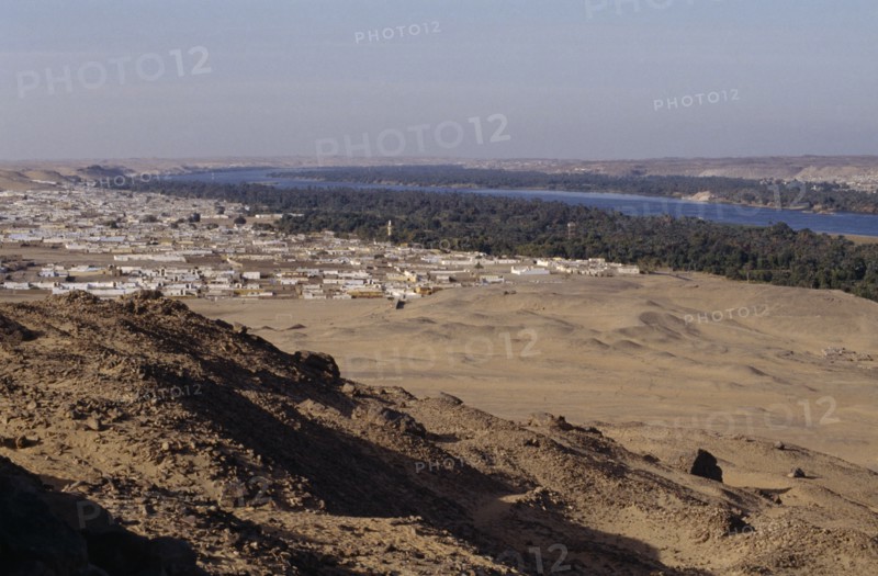EGYPT, Nile Valley, Near Aswan , View form hillside over Nubian village on the bank of the Nile