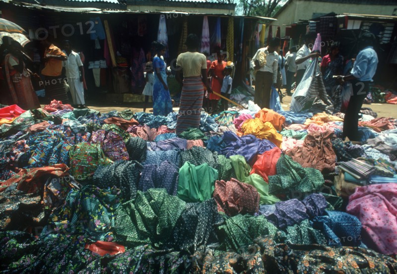 SRI LANKA, Kandy, Black market smuggled fabrics and goods on sale in market