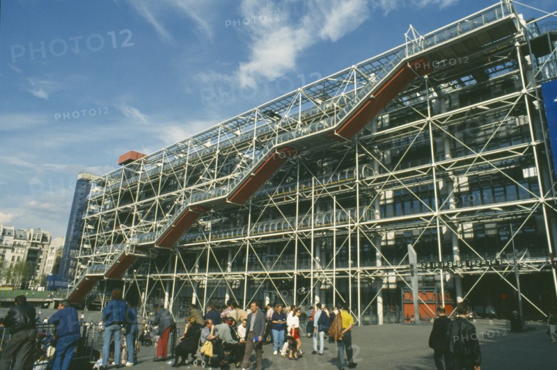 FRANCE, Ile de France, Paris, Beaubourg. Exterior view of the Pompidou Centre facade with gathered crowds in the foreground