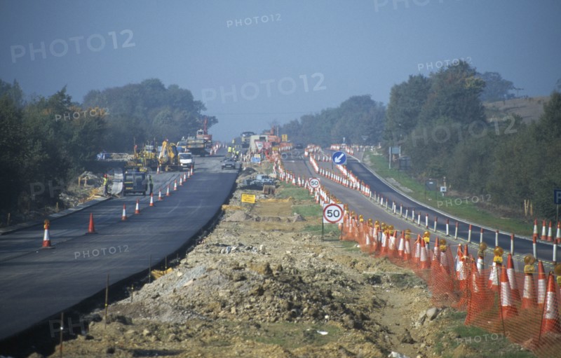 ARCHITECTURE, Construction, Roadworks, View along the A21 lined with traffic cones and new tarmac road surface
