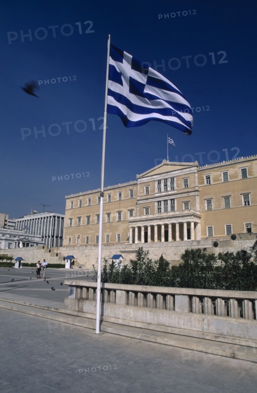 GREECE, Athens , Parliament Building and Greek Flag in the foreground