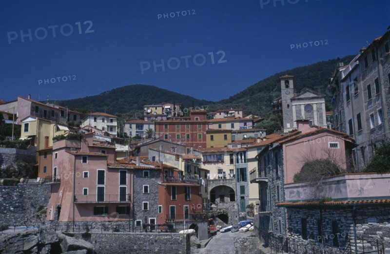 ITALY , Liguria, Tellarro, "View inland, of small colourful town with a slipway for boats"