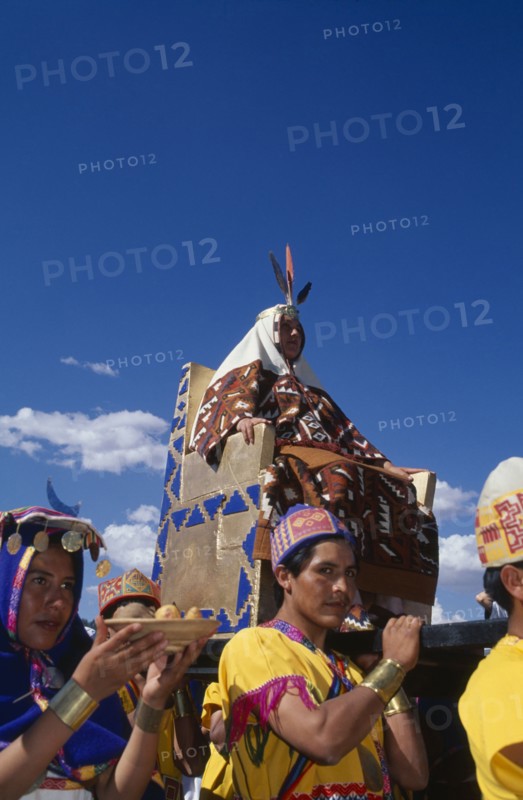 PERU, Cusco Department, Cusco, The wife of the Emperor Pachacuti being carried in her throne at Inti Raymi.