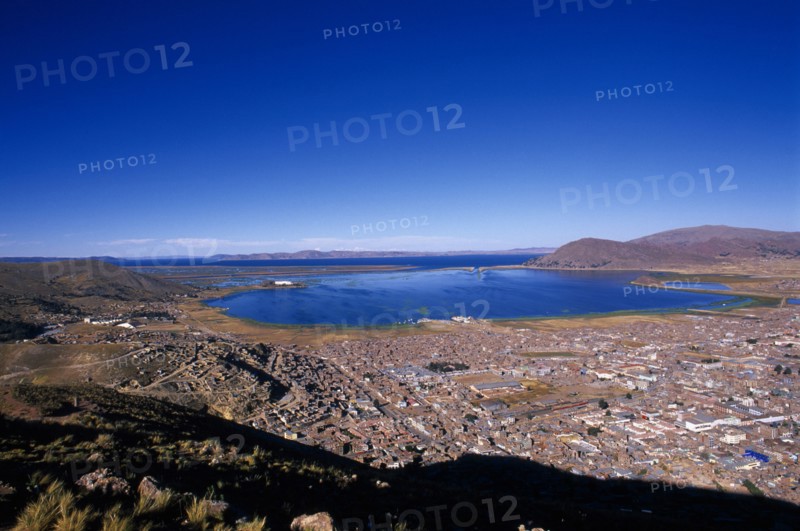 PERU, Puno Administrative Department, Puno, View over Puno twards Lake Titicaca in the distance.