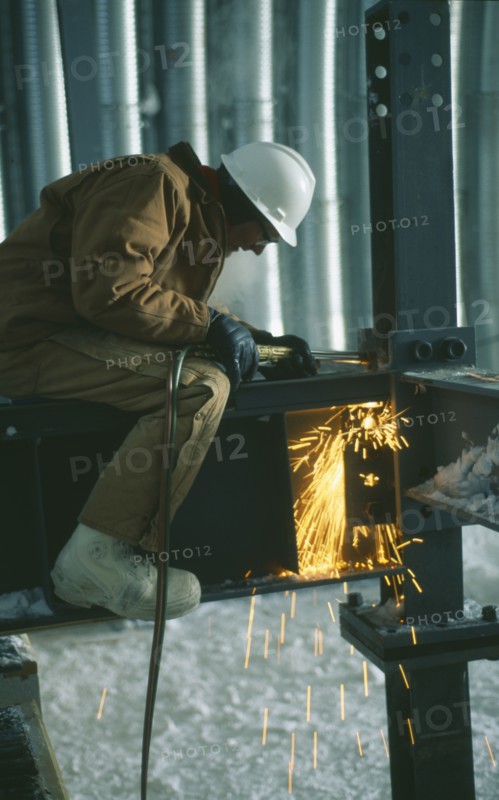 CONSTRUCTION, Welding, "Man wearing protective hat and clothing, welding on a metal structure at the US Amundsen-Scott South Pole Station. "