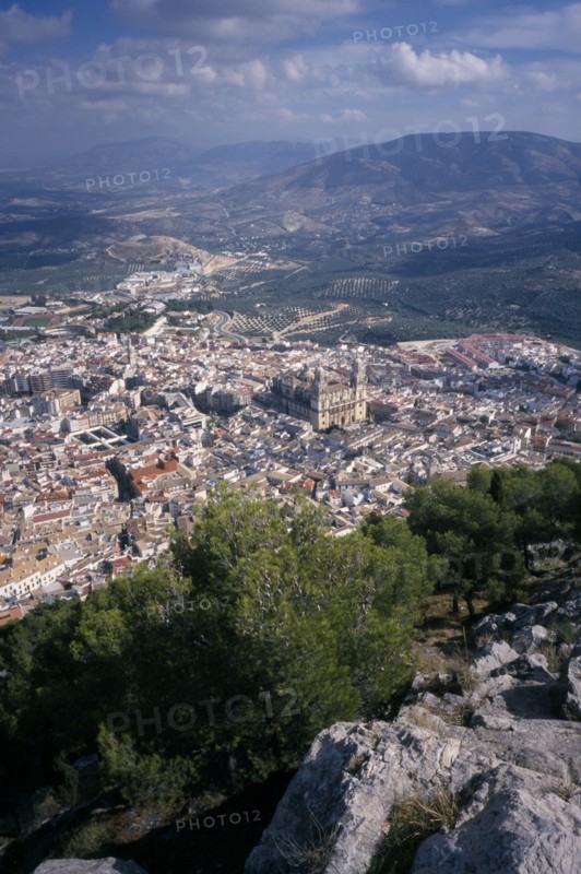 SPAIN, Andalucia, Jaén Province, "View from rocky hillside over Jaen with the cathedral in the centre, to distant hills"