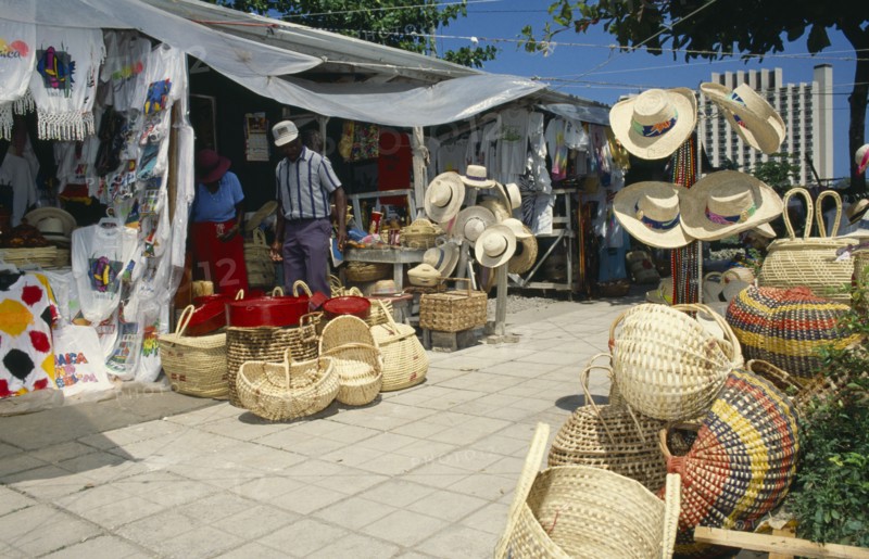 WEST INDIES, Jamaica, Ocho Rios, Tourist goods for sale in market.