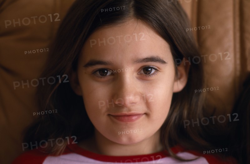 CHILDREN, Girls, Single, Portrait of smiling girl aged eleven with brown eyes and hair.