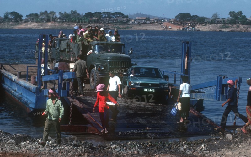 CAMBODIA, Phnom Pehn, "Motor ferry from Phnom Pehn to Kampong Cham with truck , car and foot passengers."
