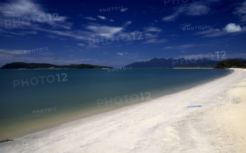 MALAYSIA, Kedah, Langkawi, Pantai Tengah beach looking towards Pulau Rebak Besar island and Gunung Mat Cincang