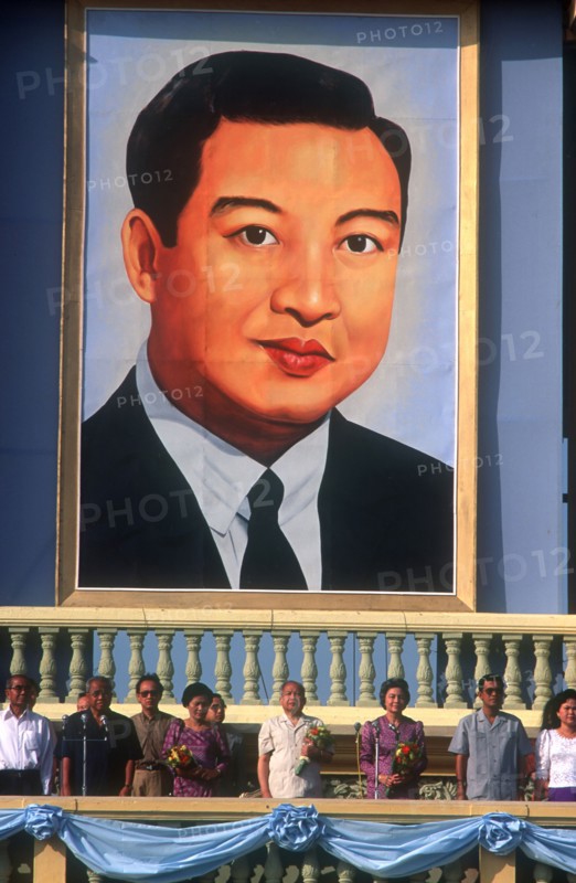 CAMBODIA, Phnom Pehn, Norodom Sihanouk addresses Phnom Pehn after the elections of November 1991.  Large portrait backdrop.