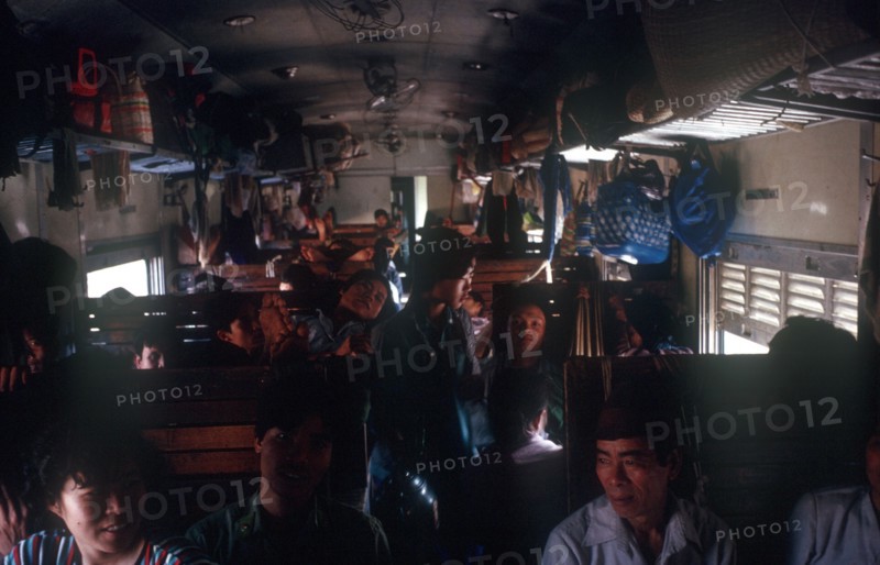 VIETNAM, Transport, The crowded interior of a third class train compartment travelling from Nhetang to Ho Chi Minh City.
