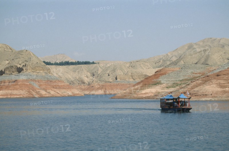 CHINA, Gansu Province, Yellow River, Linjiaxia Reservoir  with ferry