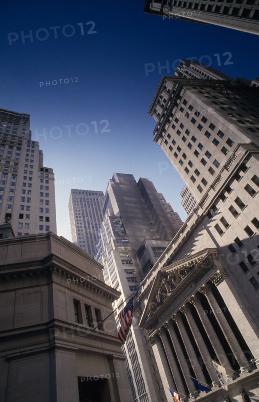USA, New York, Manhattan, The Stock Exchange building front in a narrow street