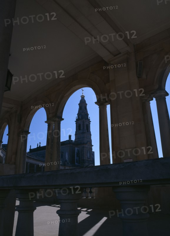 PORTUGAL, Beira Litoral, Fatima, Church seen through cloister arches